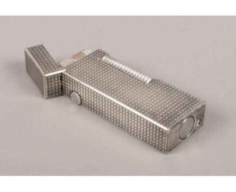 A 1960's Dunhill cigarette lighter. Stamped to the base.  