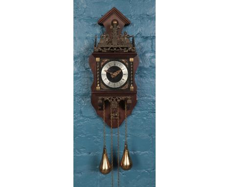 A mid century dutch Atlas mahogany wall clock, with twin weights and German FHS movement.  