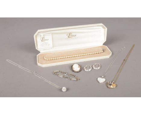 A collection of silver jewellery, accompanied by a boxed  Lotus simulated pearl necklace. To include silver cameo brooch (ass