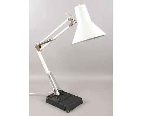 A Micromark articulating anglepoise lamp, with enamel body and shade. In working order.  Chip on base, some enamel missing fr
