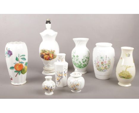 A collection of Aynsley ceramic's. 'Georgian fruit', 'Edwardian Kitchen garden' 'Just Orchids'. Table lamp, vases, lidded jar