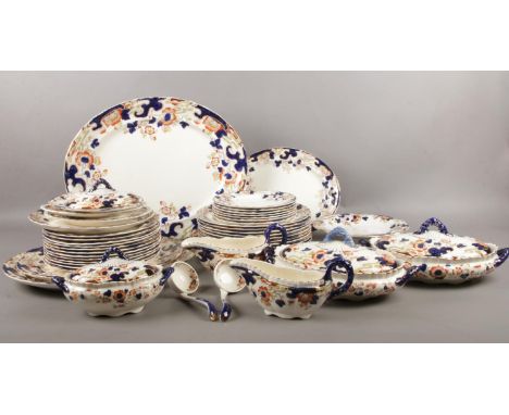 A large quantity of late 19th/early 20th century Keeling &amp; Co 'Tokio' dinner service. Meat platter, plates, lidded tureen