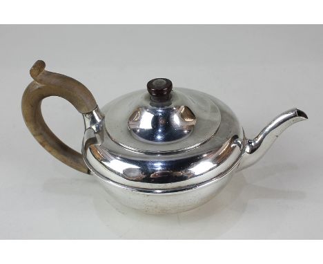 A George V silver bachelor's teapot, makers Charles &amp; Richard Comyns, London 1922, 6oz