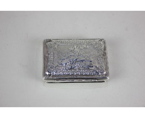 A Continental white metal rectangular snuff box with copper inset lid, engraved with a pastoral scene of a piper with animals