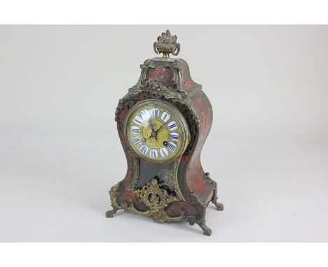 A late 19th century French Boulle mantel clock with 10cm dial, blue and white enamel cartouche Roman numerals, in domed case 