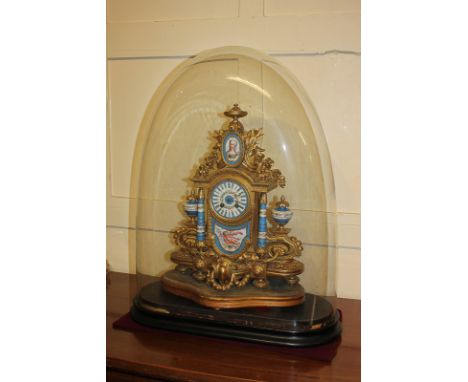 A 19th century French porcelain and ormolu mantel clock, the painted dial with Roman numerals, the movement stamped Japy Frer