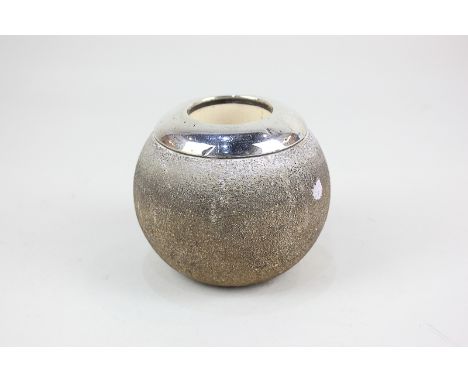 A late Victorian silver mounted ceramic match strike, globe shape with silver collar hallmarked Birmingham 1900, 9cm high