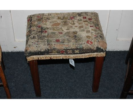 A 19th century mahogany framed upholstered tapestry footstool, (a/f) 33cm high