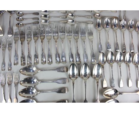 A George III and Victorian silver seventy piece part canteen of fiddle pattern cutlery, to include 12 tablespoons, 12 dinner 