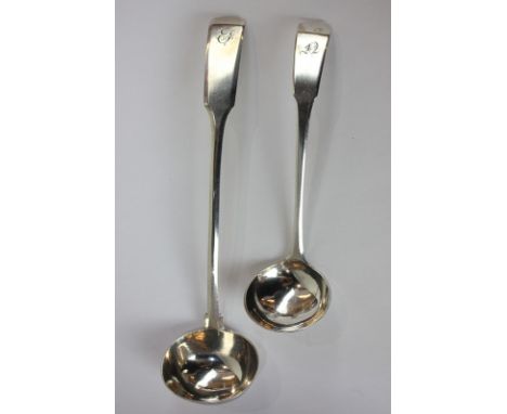 An early 19th century Scottish provincial silver sauce ladle, fiddle pattern handle with engraved initial maker Thomas Stewar