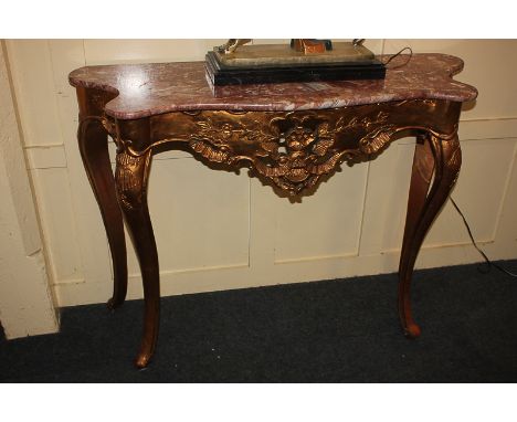 A Louis XVI style console table with marble top, on slender cabriole legs, 120cm