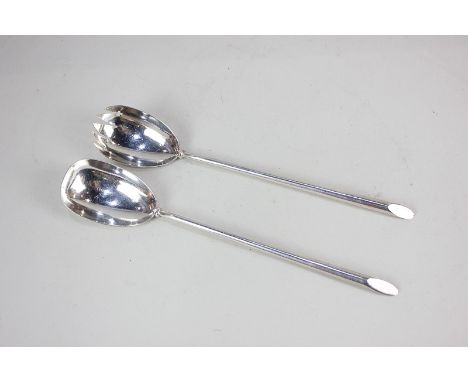 A pair of Edward VII silver salad servers, oval bowls with long tapered handles, maker William Hutton &amp; Sons Ltd, London 