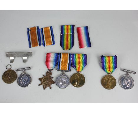 A set of three First World War medals awarded to 53580 PTE A Krautz Durh.L. I, a pair of medals awarded to G.47892 PTE T Krau