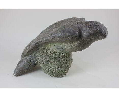 A carved stone sculpture of a bird of prey, 24cm, (a/f)
