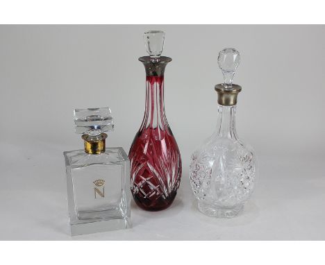 A modern silver gilt mounted glass decanter, rectangular form incised with gilt coloured 'N', with square shaped stopper, a s