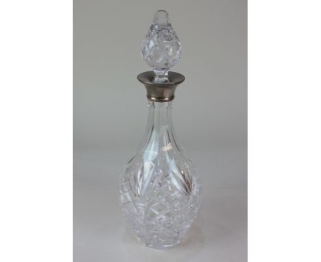 An Elizabeth II silver collared cut glass decanter, maker A Chick &amp; Sons Ltd, Birmingham 1977