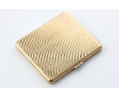 A George V 9ct gold cigarette case, rectangular shape with engine turned decoration, maker Adie Brothers, Birmingham 1926