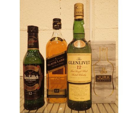 Four bottles of Scotch Whisky - Glenlivet, Black Label, Glenfiddich & Jura   CONDITION REPORT:  We are unable to post this lo