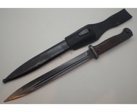 Bayonet with oak and steel grip, marked H2138 and a non matching leather frog marked RZM with steel scabbard   CONDITION REPO