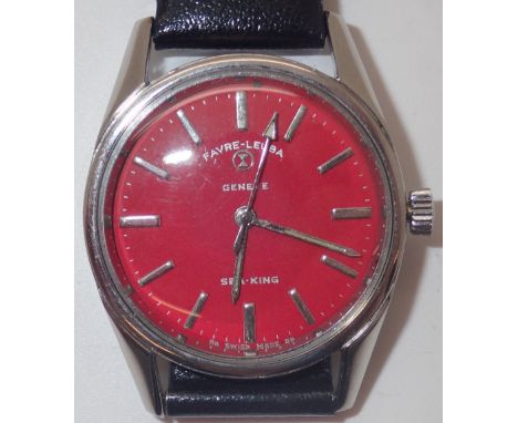 Red faced stainless steel Favre Leuba wristwatch, on leather strap   CONDITION REPORT:  This item ticks when wound and advanc