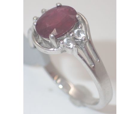 Sterling silver oval ruby solitaire ring, size P/Q