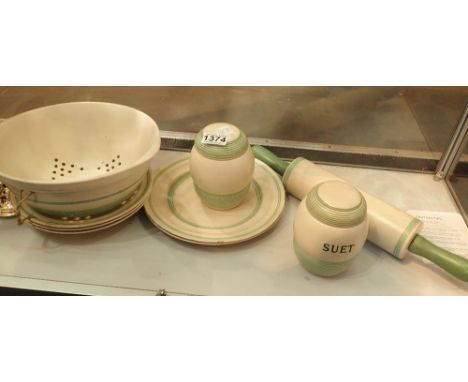 TG Green Kleen Green suet pot, raisins pot, colander, rolling pin, three bowls and two plates    CONDITION REPORT:  Rolling p