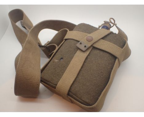 UK military issue metal flask and carrier with cork stopper   CONDITION REPORT:  Press stud is working at lotting. Crows foot