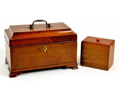 A GEORGE III MAHOGANY TEA CADDY WITH BARBER POLE STRINGING, THE INTERIOR WITH  LATER CANISTERS ON OGEE FEET, 24CM W