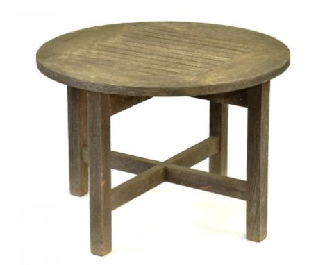 A TEAK GARDEN TABLE, THE ROUND TOP 55CM W