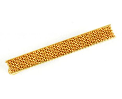 A GOLD TIE CLIP, MARKED 18K, 7G