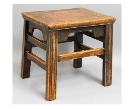 A 19thC. oak stool with straight moulded legs, 15.25in high