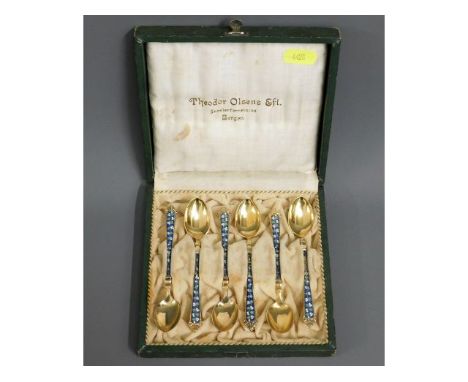 A set of c.1920 Norwegian silver &amp; enamel tea spoons by Theodore Olsen, one spoon with small area of damage, 72.8g 