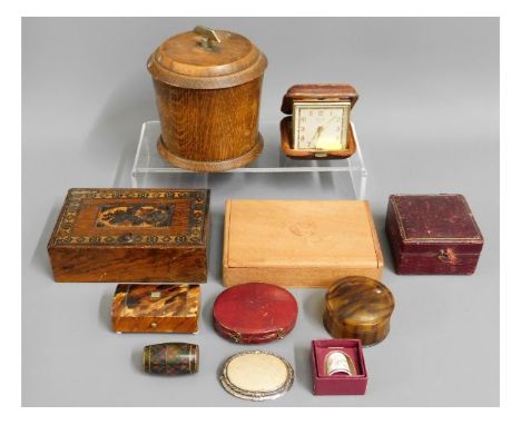 A 1930's oak tobacco jar, a small brooch case with silver backed brooch a/f, a tortoiseshell box, other boxes, a travel clock