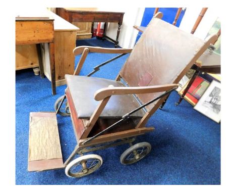 An early 20thC. John Ward Ltd. Tottenham Court, London invalid chair