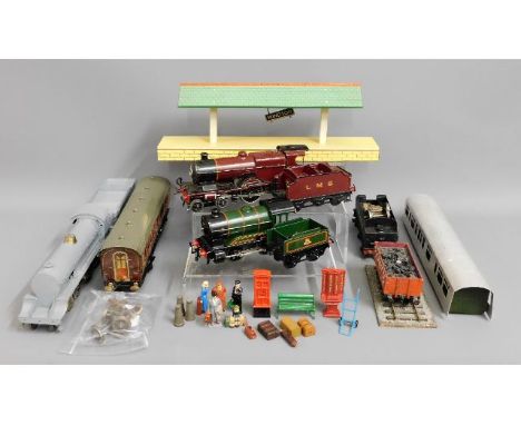 An O Gauge toy steam engine, rolling stock &amp; other related items &amp; accessories 