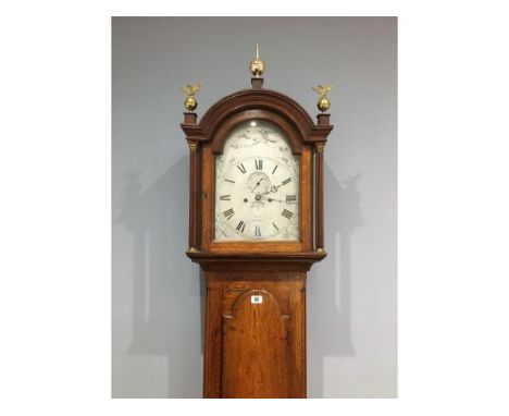 A late 18thC. George III oak cased William Paddon of Modbury, long case clock with silvered dial &amp; brass finials, 89.5in 