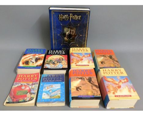 Eight Harry Potter, six hardback &amp; two paper back books including five first editions, twinned with Harry Potter book rel