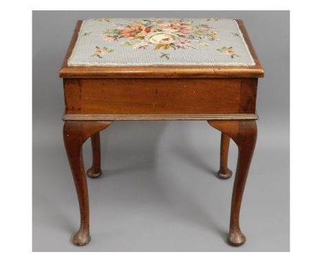 A c.1910 G. W. Hicks &amp; Son mahogany music stool on cabriole legs, 21.25in high