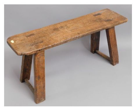 A 19thC. elm joint bench, 29.5in wide x 13.75in high