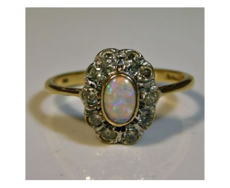 A 9ct gold ring set with diamond &amp; opal, size N, 2.3g