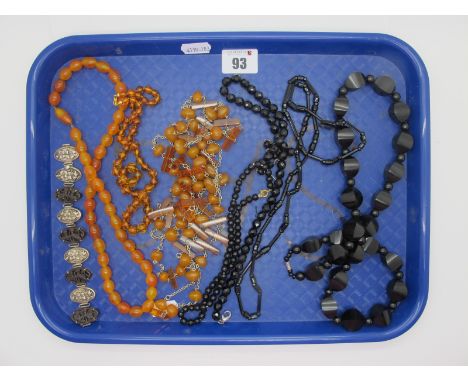 A Small Collection of Amber Coloured Bead Necklaces, together with a small collection of jet coloured bead necklaces, and a f