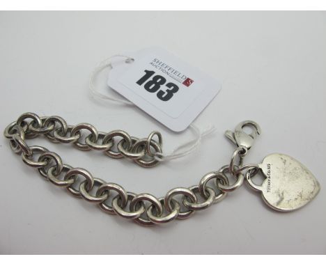 Tiffany &amp; Co; A Modern Bracelet, (clasp damaged) suspending heart panel stamped "Tiffany &amp; Co 925". 