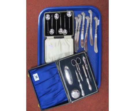 A Hallmarked Silver Mounted Manicure Set, in a fitted case; Together with A Cased Set of Six Hallmarked Silver Coffee Spoons,