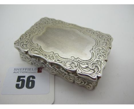 A Victorian Hallmarked Silver Snuff Box, Edward Smith, Birmingham 1857, of shaped rectangular form, allover leaf scroll engra