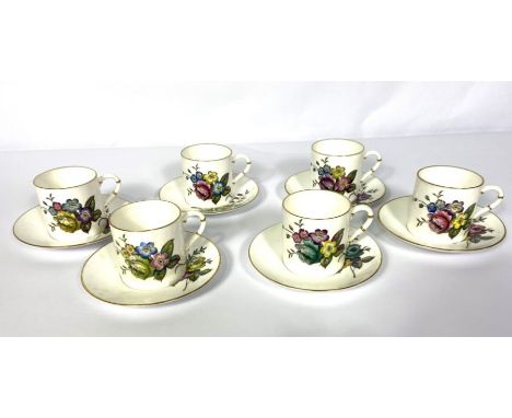 A set of six Royal Worcester coffee cans and saucers, decorated with roses; together with assorted porcelain tea service item