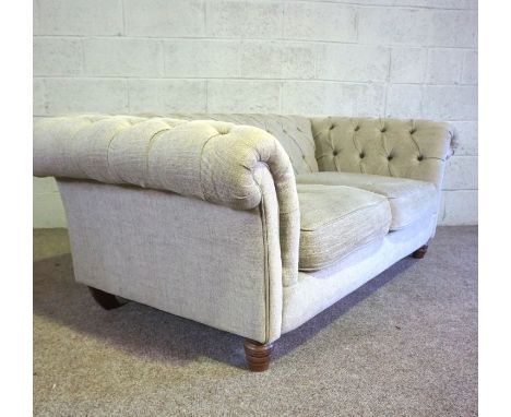 A good vintage Chesterfield two seat sofa, circa 2000, with button back and currently upholstered in silver grey fabric, 190c