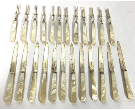A set of twelve pairs of George V silver and mother of pearl fruit eaters, hallmarked Sheffield 1934