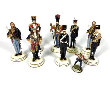 A set of eight decorative regimental figures including the Royal Horse Artillery, 1928 and other ceramic figures