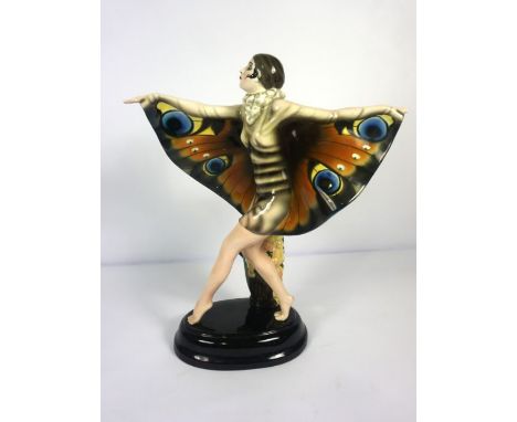 A Goldsheider ceramic painted figure of The Butterfly Girl, after Josef Lorenzl, base stamped 5230 / 751 and back inscribed ‘