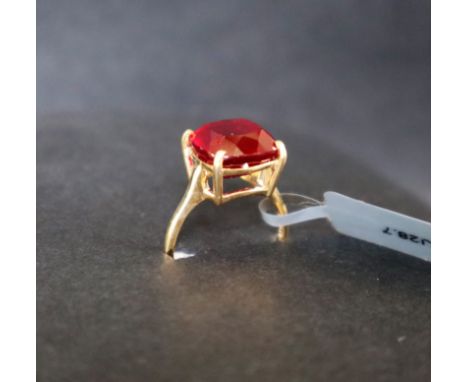A Malagasy ruby 9k gold ring, set with a cushion cut 8.87ct ruby, size N to O